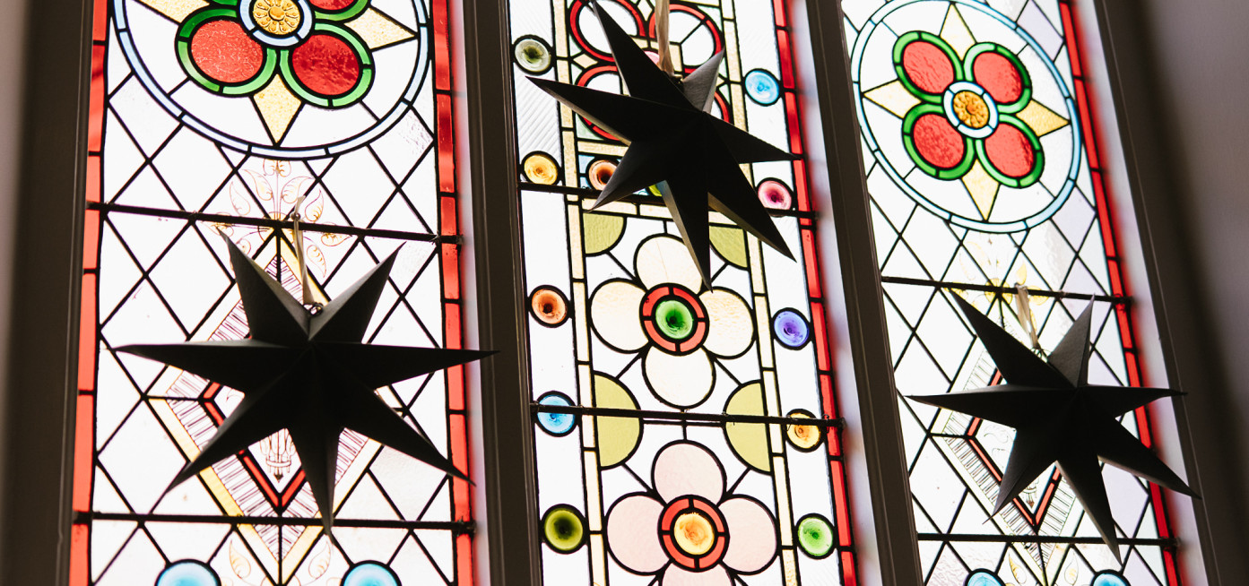 Christmas Stars on stained glass window Hotel VARA Truro